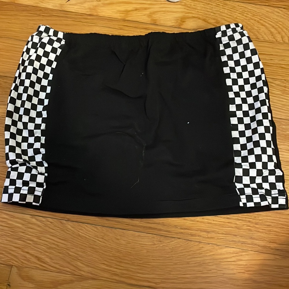 Strapless cropped black top with checkered sides. Size M from Amazon. Worn once.